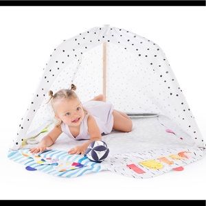 LOVEVERY wooden play gym with polka dot cover